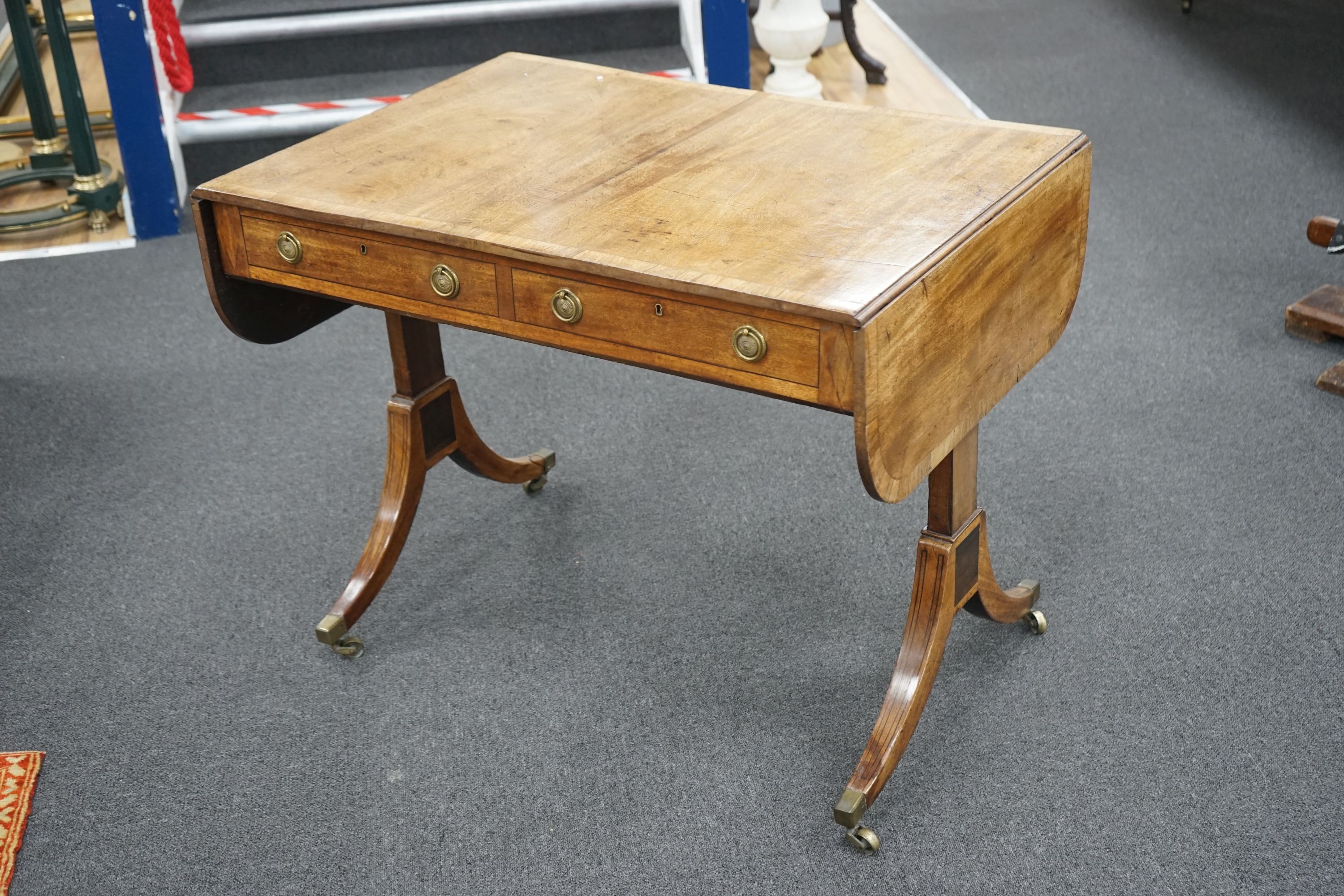 A Regency rosewood banded mahogany sofa table, width 91cm, depth 65cm, height 70cm